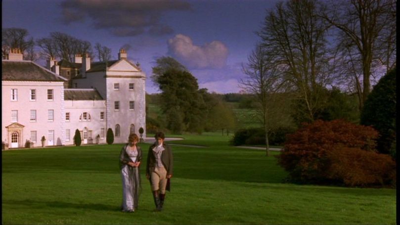 Elinor (Emma Thompson) and Edward (Hugh Grant) stroll through Norland in director Ang Lee's 1995 film.